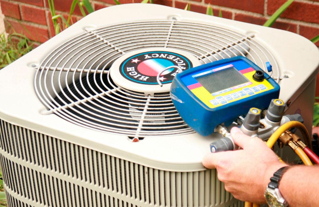 Technician checking indoor airflow during residential HVAC repair diagnostics